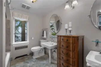 PBa - Elegant and exceptionally maintained, this bath blends traditional design with a bright and serene waterfront outlook.