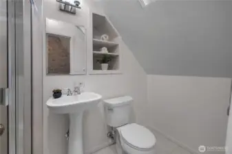 Jr Suite 3/4 Ba - Clean, bright, and efficiently designed, this bath provides a fresh and functional complement to the upper-level 2nd suite.