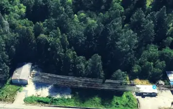 The lot is inbetween teh warehouse and the small building on the irght. 1/4 lot with easement access through Lot 3.