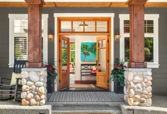 Charming Porch w/Dbl Doors and Wood Posts.