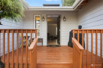 Welcoming front porch and newly painted door.