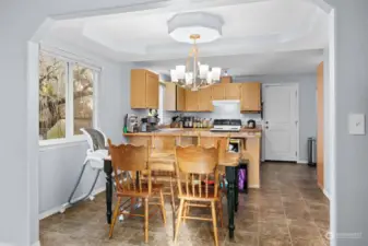 Dining room with upgraded chandelier.