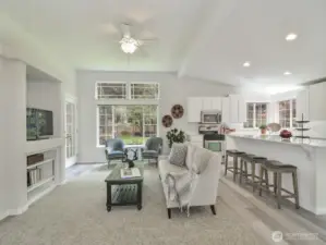 Enter the great room with see-through gas fieplace.