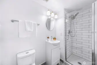 Fully remodeled bathroom in the primary bedroom.