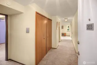 Entry has large closets for storage