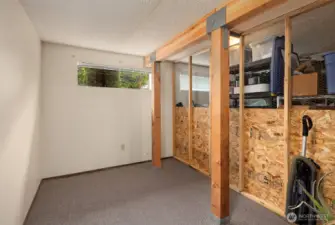 Large, secured heated storage in basement.