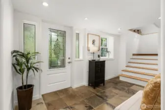 Entry has been freshly painted & boasts tile flooring