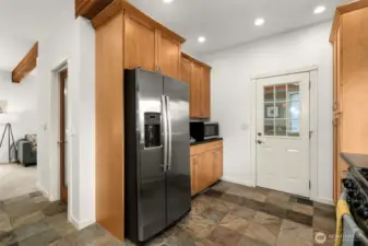 Door leads to mud room off of kitchen
