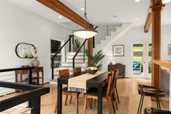 Open staircase leads you to the primary suite