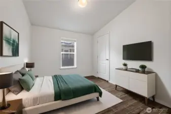 Virtually staged secondary bedroom.