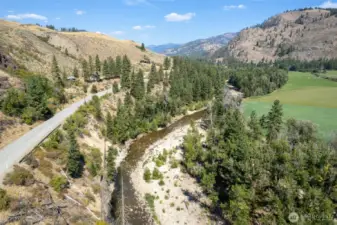 Own a private, quiet and lovely stretch of the beautiful Chewuch River.