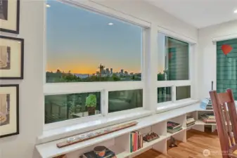 Low shelf is built-in, custom blinds included, hardwood floors have just been refinished!