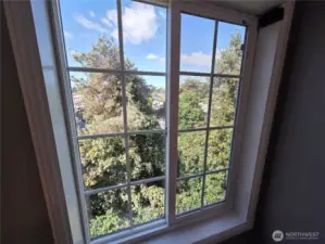 Greenbelt outside both bedrooms for privacy