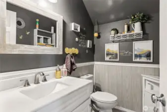 Convenient, easy access main level powder bath