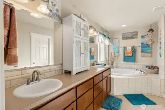 All the room you need to prep for the day in your primary bath.