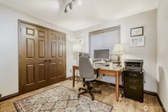 One of the bedrooms, currently being used as a home office.