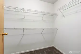 Primary walk-in closet off the bathroom.