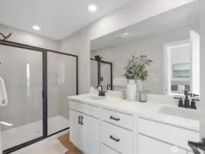 Luxurious walk in shower in primary bathroom.