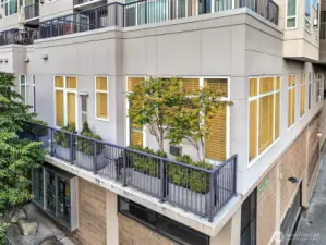 corner home with 11 ft ceilings and petite balcony