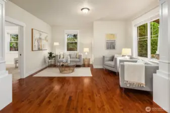 Front living room with adjacent bedroom or office space.