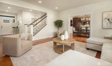 Spacious family room with pocket doors leading to kitchen.