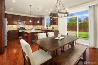 Kitchen with sliding glass doors to backyard space.