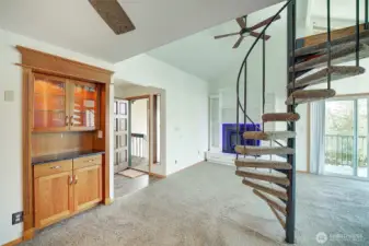 Enter into this spacious unit with gas fireplace and cool loft space