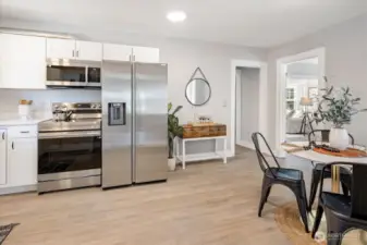 Brand new stainless steel appliances, including an exterior-vented microwave for enhanced air quality