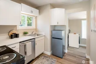 Accessory home with full kitchen prefect for multi-generational households, a turnkey rental, or a private office