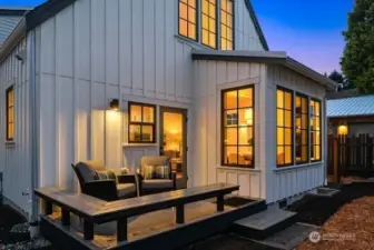 A cozy rear deck with bench seating is just off the kitchen and dining room and overlooks the fenced rear yard, just right for your pup and BBQ.