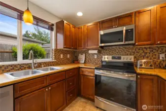 Newer Stainless Steel appliances in kitchen