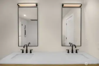 Two vanity completes the luxe feel and function of the primary bath.