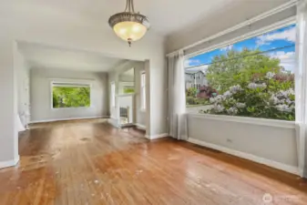 Diamond in the rough! Lots of potential! Living room and dining room have large picture windows for plenty of natural light.