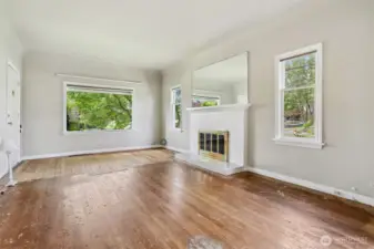 Imagine this with a new floor! Most likely it could be installed over the top of the original flooring.  Coved ceilings could be accented by adding chair rail molding and new paint colors.