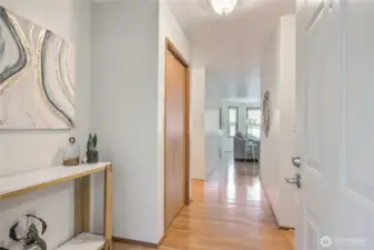 Entry with hardwood flooring.