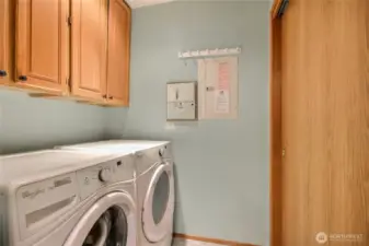 Walk in laundry with side-by-side washer/dryer