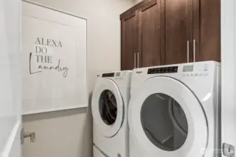 Upstairs laundry room with washer dryer w/pedestals