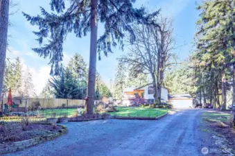 Tranquil property offering privacy, set back from the road.