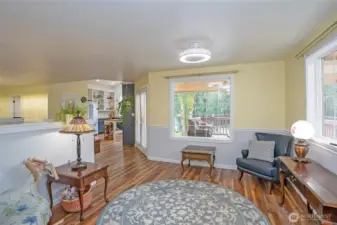 The main-level sitting parlor opens to a bright, welcoming entry.