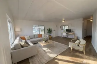 Virtually staged - large open living room.