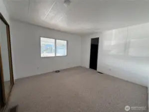 Primary bedroom with two closets.
