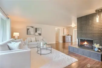 Living room with the wood burning fireplace