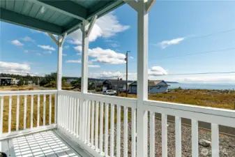 Front porch looks South to the sound, Olympic Mountains and Ferry crossing