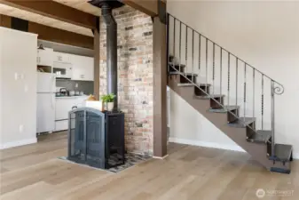 Gas stove heats the entire place but also has electric wall heaters