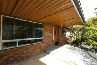 Easily accessible front door with no stairs and beautiful brick