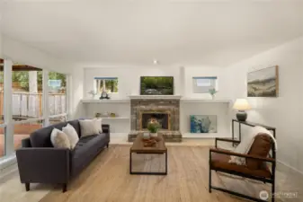 Lovely family room with oversized windows filling the home with light