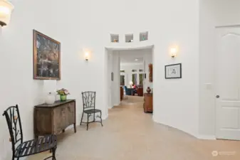 The round vestibule in the entry has dramatic, curved walls and the skylight at the top brings in natural light all year round.