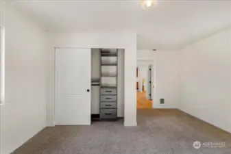 Built-in shelving in bedroom on main floor!