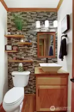 Powder room off of Family room.