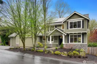 Another angle of the front of the property, with professional landscaping.